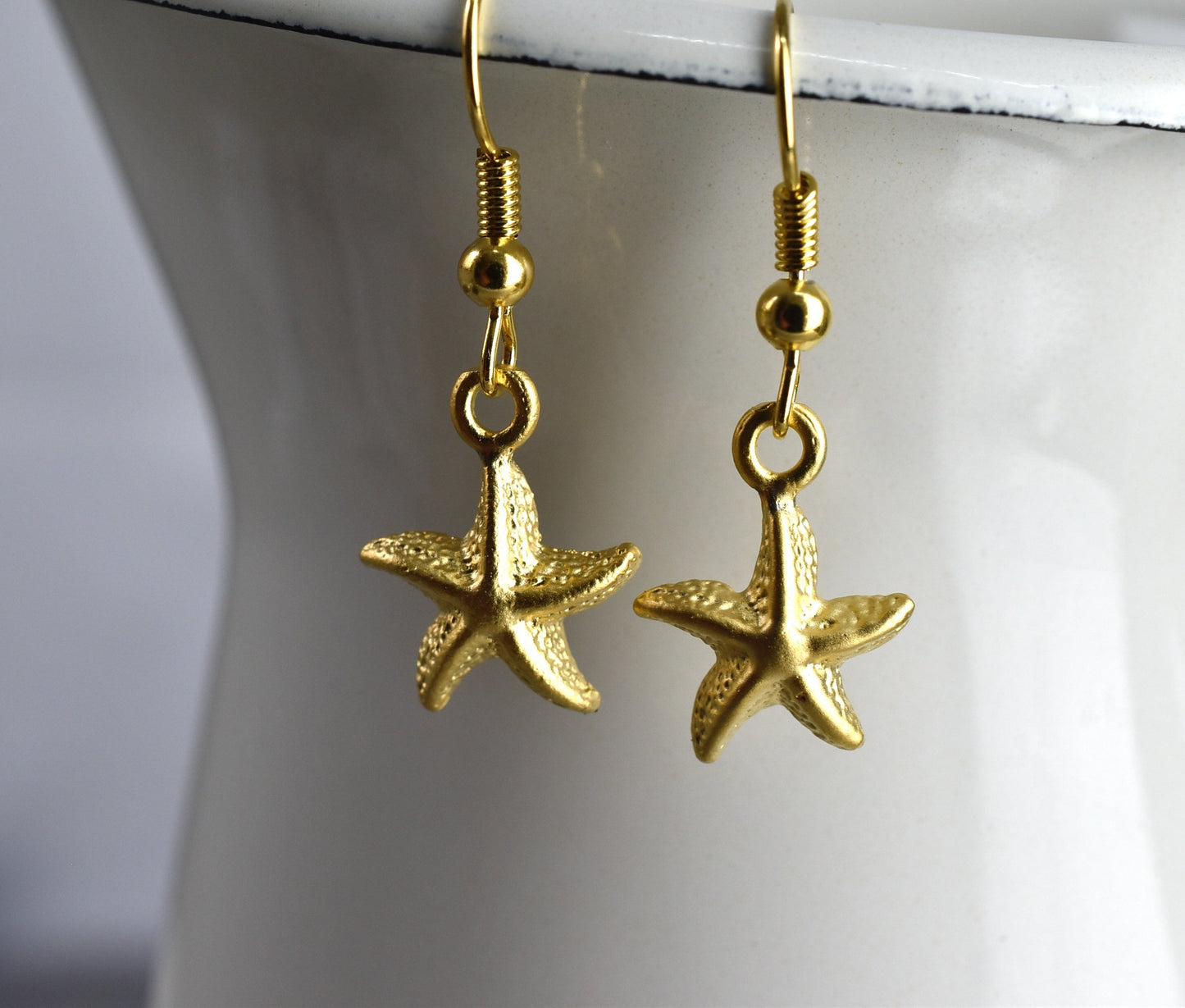 Golden earrings "starfish" - vinohr-82